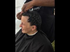 A soft crown braid flowing into a neat tail—simple, secure, and full of grace.