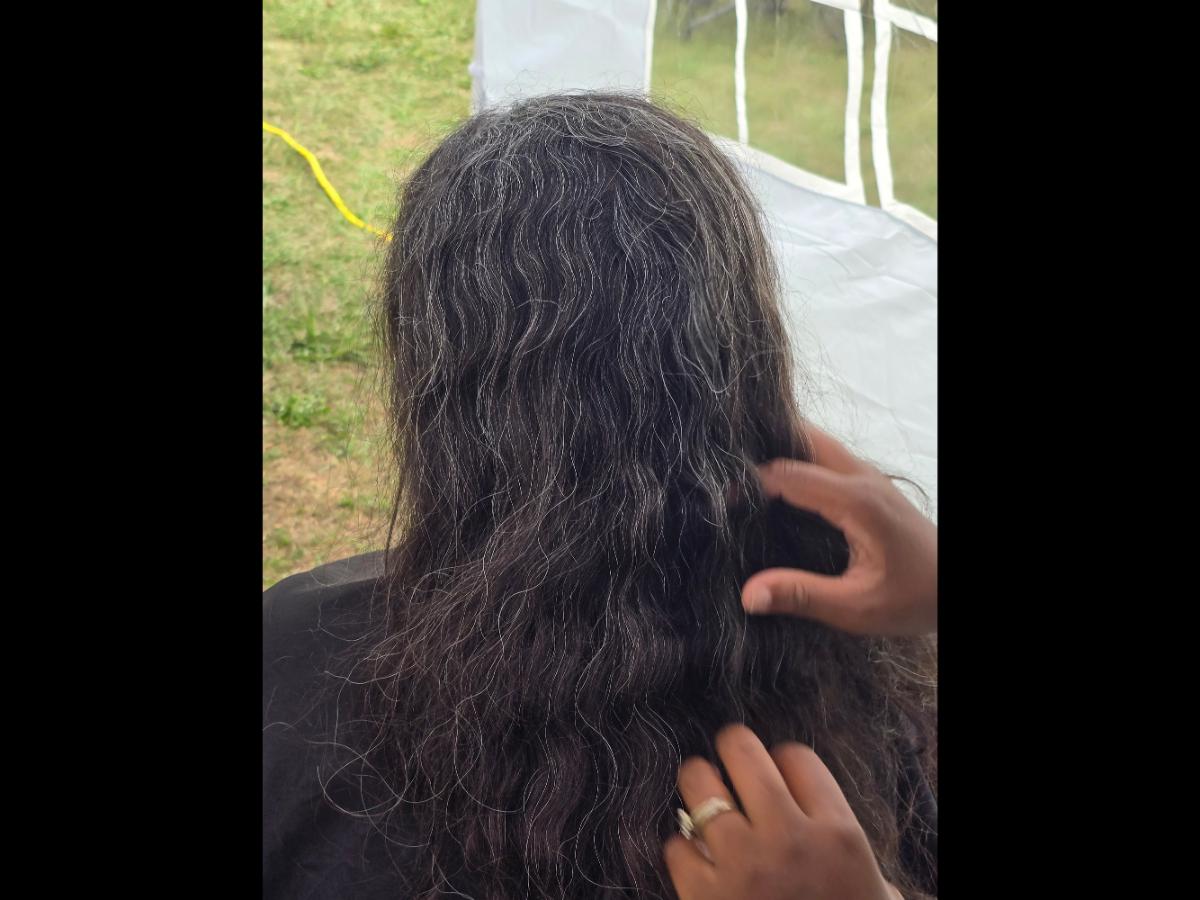 A soft crown braid flowing into a neat tail—simple, secure, and full of grace.