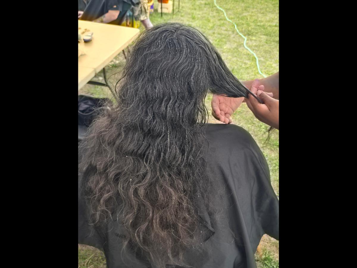 A soft crown braid flowing into a neat tail—simple, secure, and full of grace.