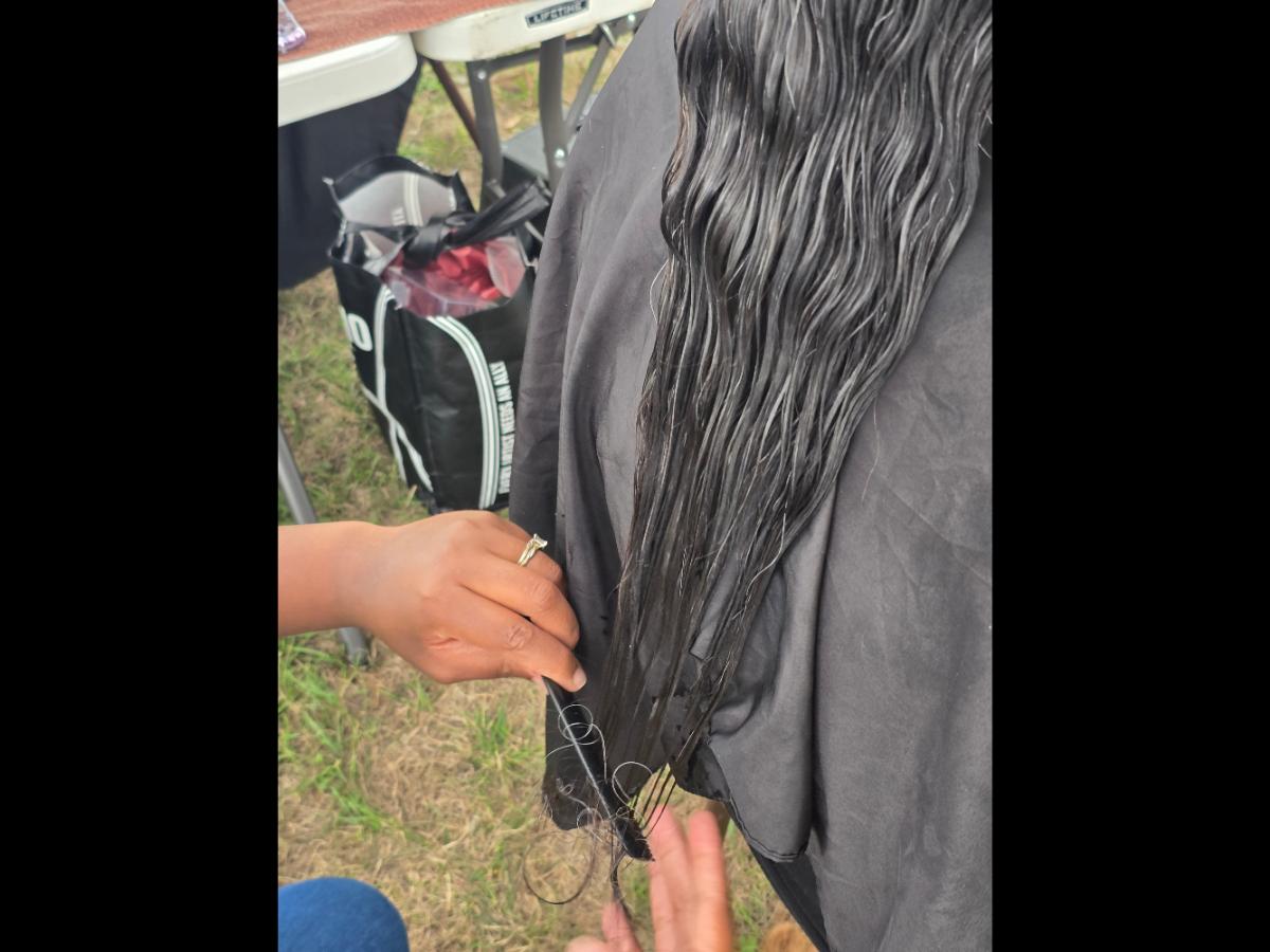 A soft crown braid flowing into a neat tail—simple, secure, and full of grace.