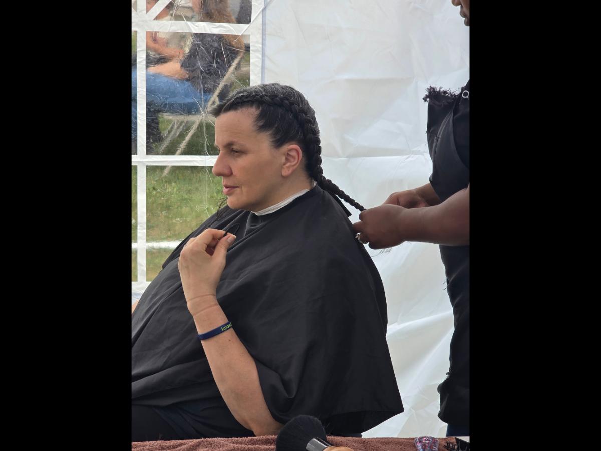 A soft crown braid flowing into a neat tail—simple, secure, and full of grace.