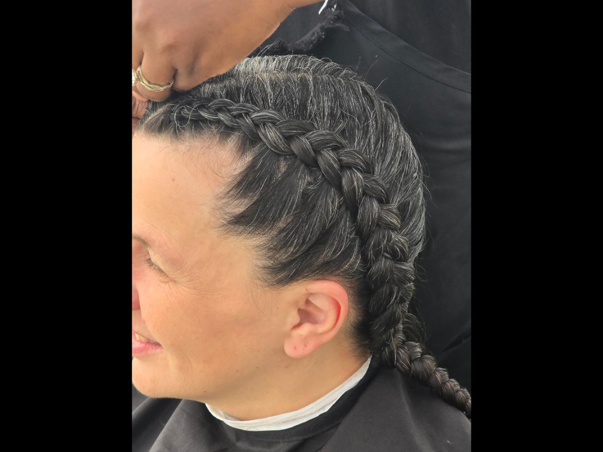 A soft crown braid flowing into a neat tail—simple, secure, and full of grace.