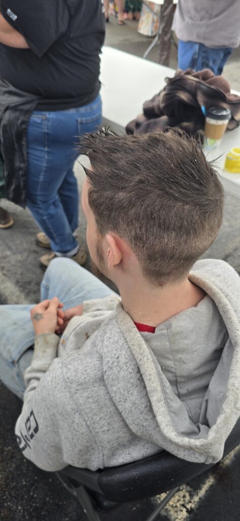 After haircut transformation at Cuts 4 Christ Lighthouse event