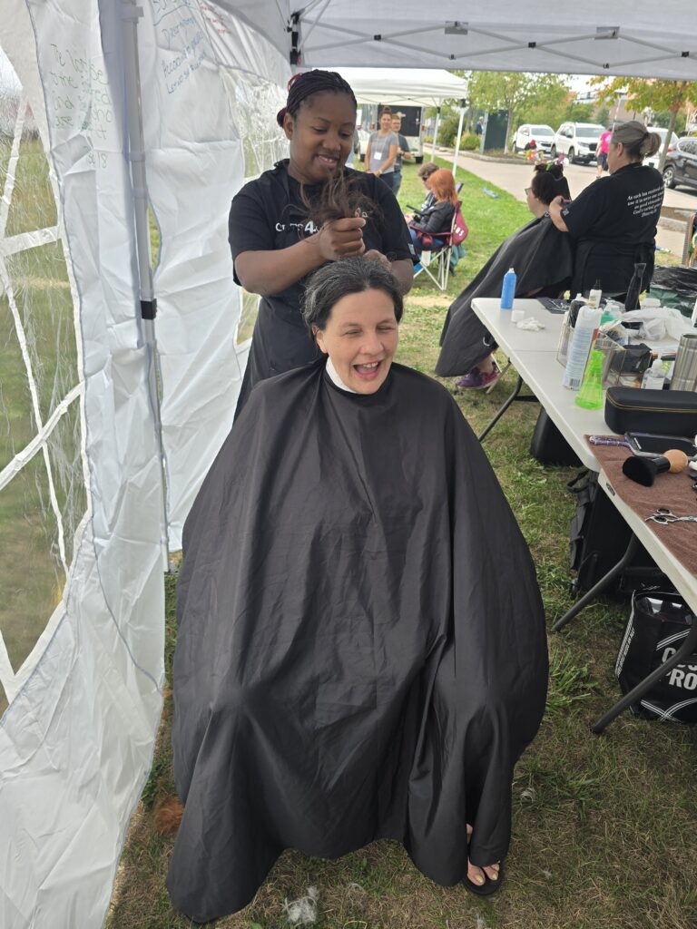 Long hair before trim and braid at Cuts 4 Christ outreach event