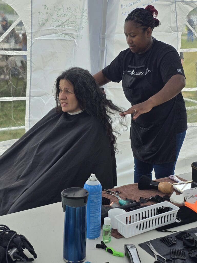 Long hair before trim and braid at Cuts 4 Christ outreach event