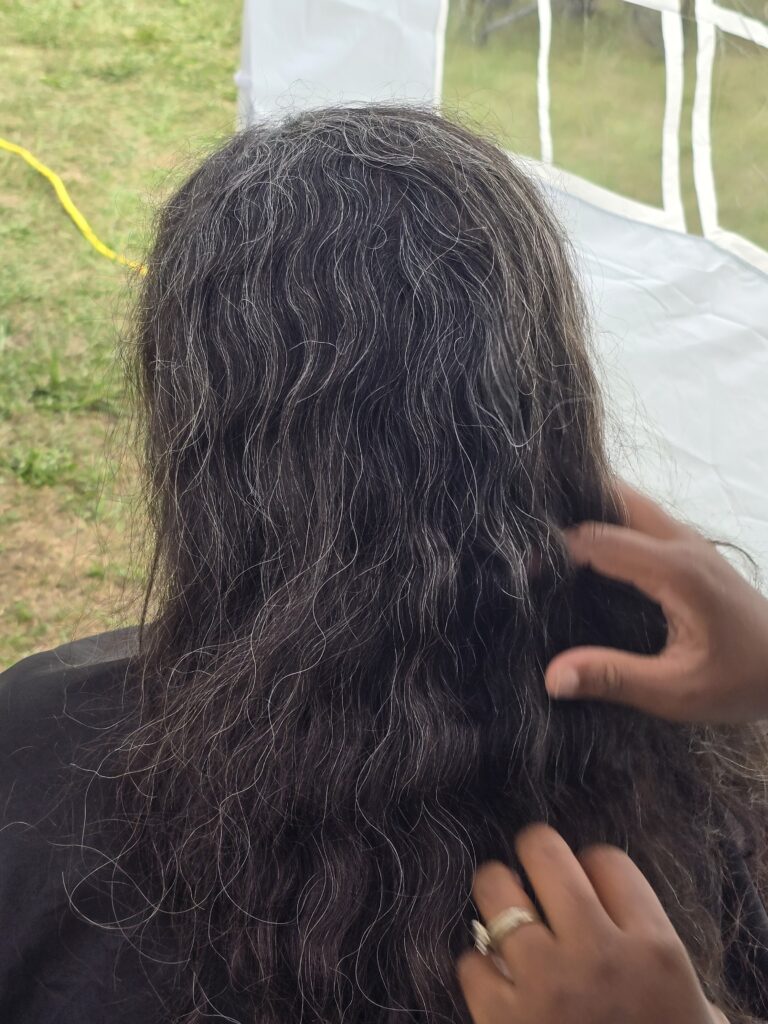 Long hair before trim and braid at Cuts 4 Christ outreach event