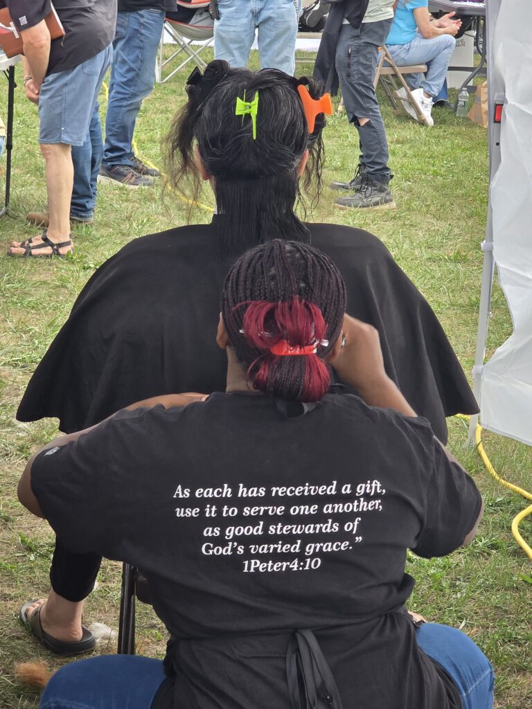 Long hair before trim and braid at Cuts 4 Christ outreach event