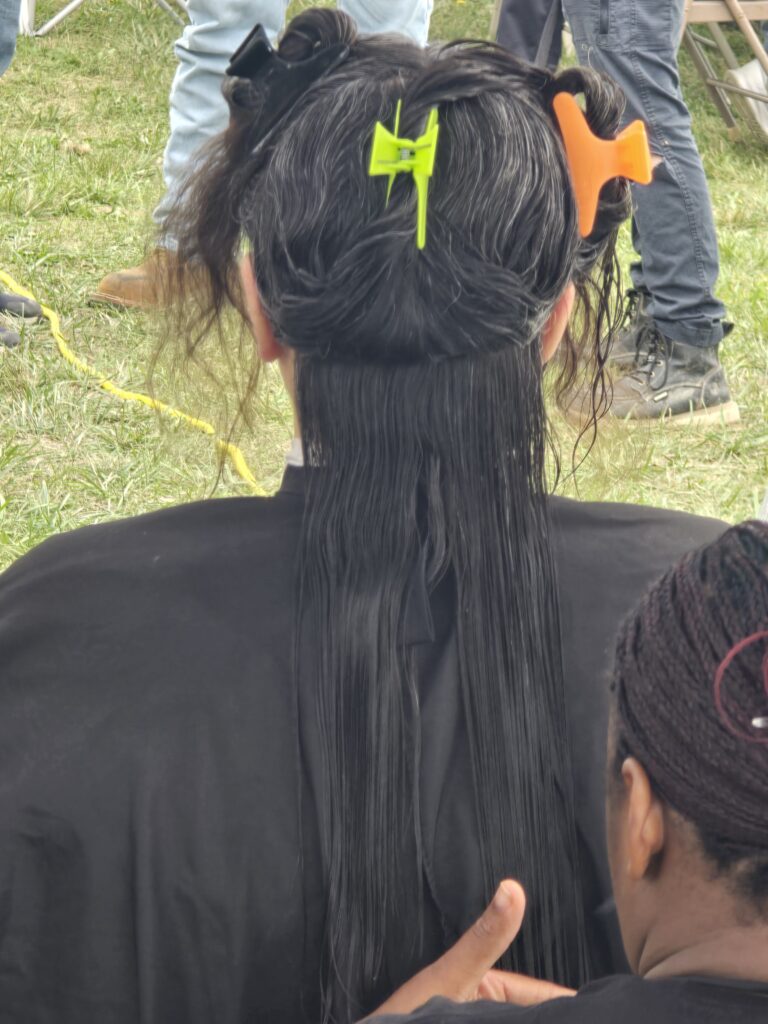 Long hair before trim and braid at Cuts 4 Christ outreach event