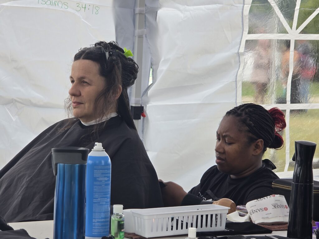 Long hair before trim and braid at Cuts 4 Christ outreach event