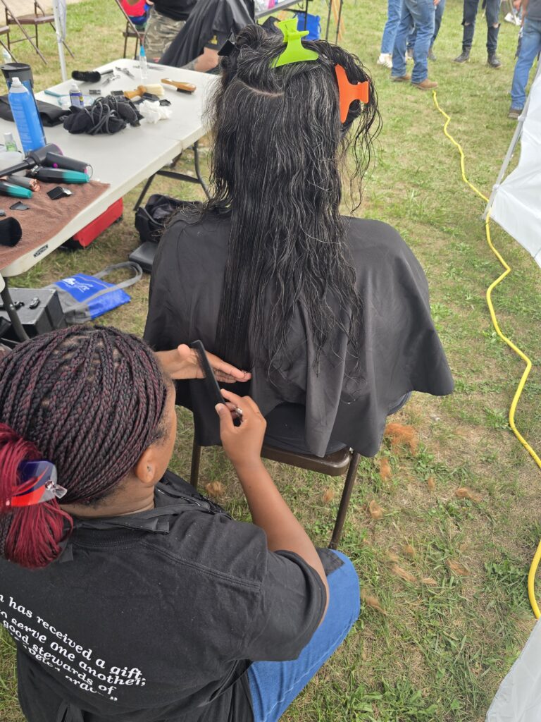 Long hair before trim and braid at Cuts 4 Christ outreach event