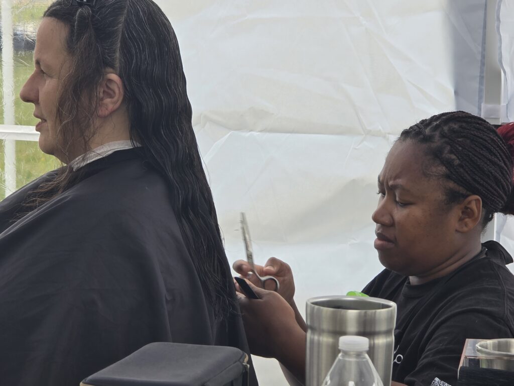 Long hair before trim and braid at Cuts 4 Christ outreach event