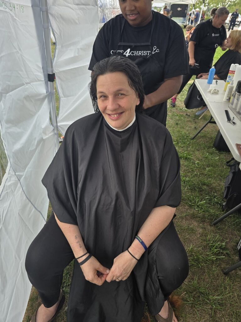 Long hair before trim and braid at Cuts 4 Christ outreach event