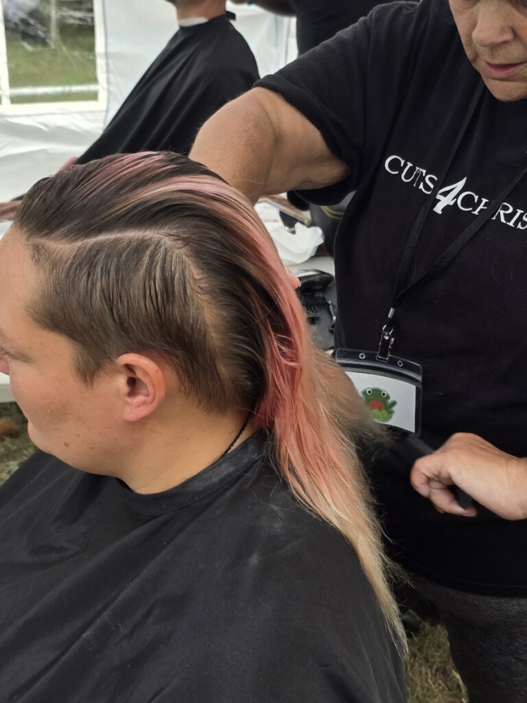 Hair before crossfade braid haircut at Day of Joy outreach event