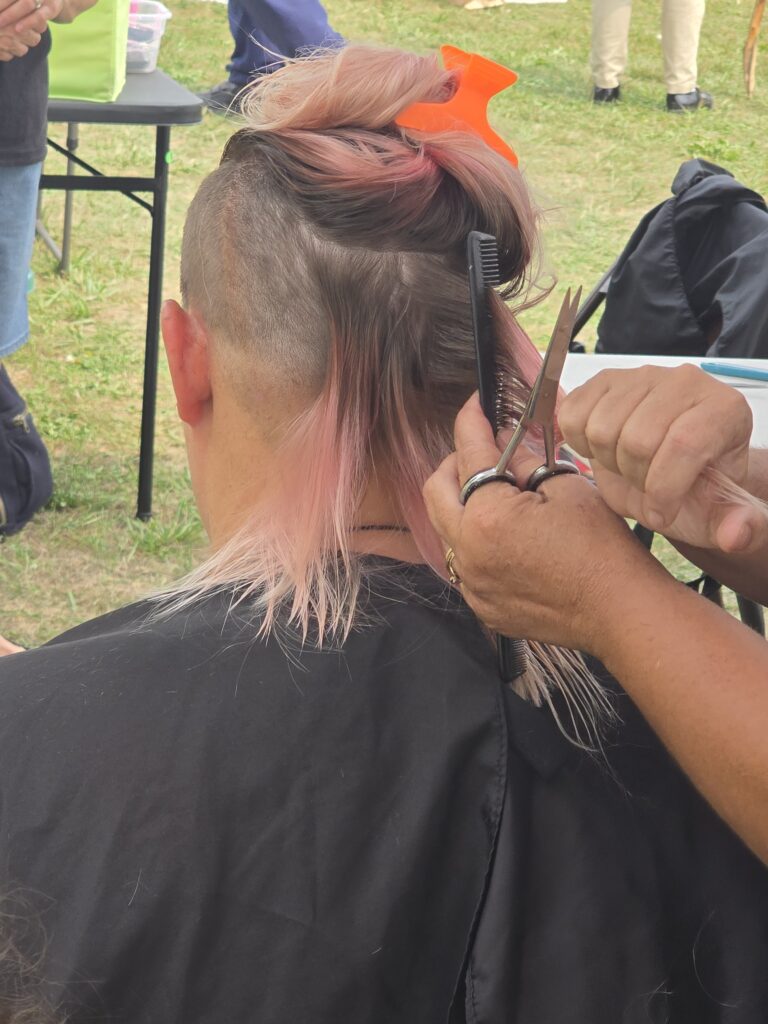 Hair before crossfade braid haircut at Day of Joy outreach event