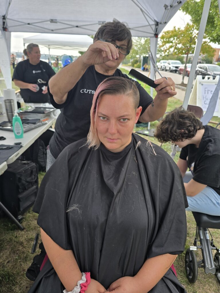Hair before crossfade braid haircut at Day of Joy outreach event