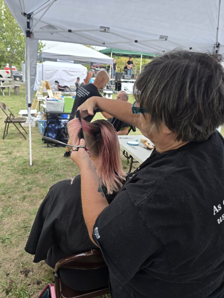 Hair before crossfade braid haircut at Day of Joy outreach event