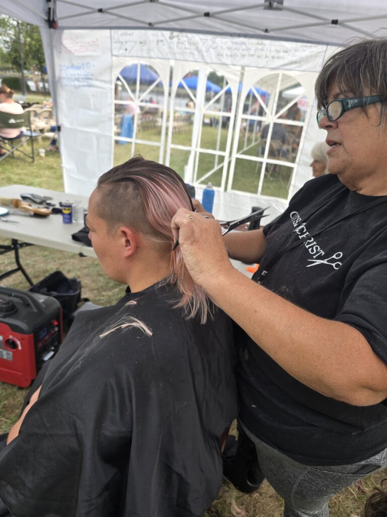 Hair before crossfade braid haircut at Day of Joy outreach event