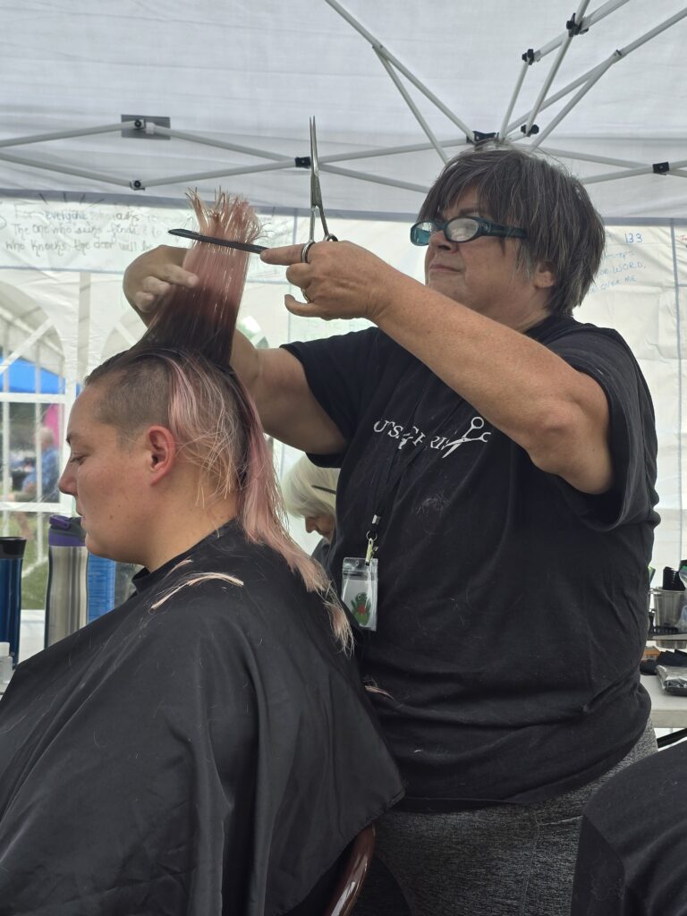 Hair before crossfade braid haircut at Day of Joy outreach event