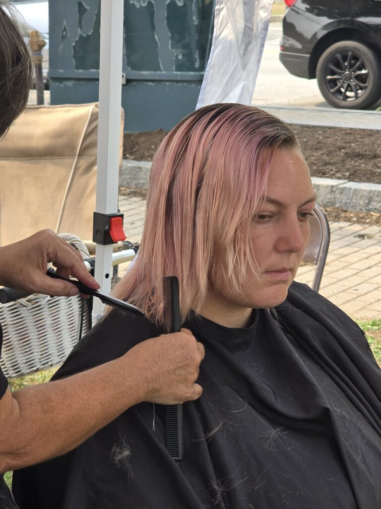 Hair before crossfade braid haircut at Day of Joy outreach event