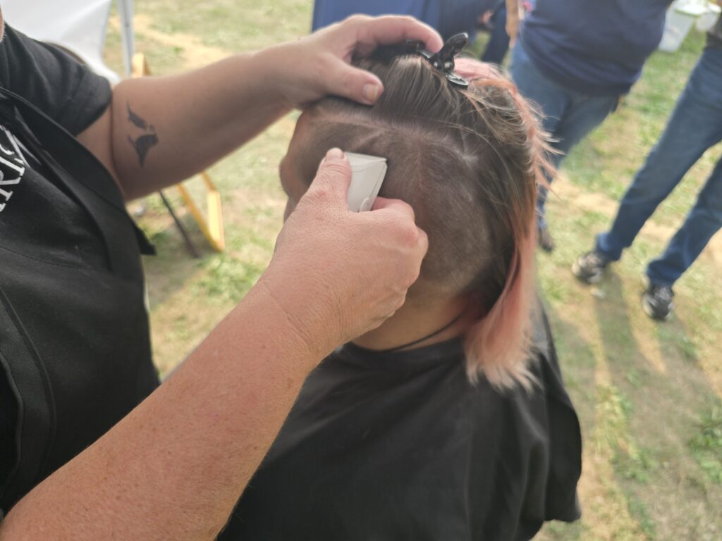 Hair before crossfade braid haircut at Day of Joy outreach event