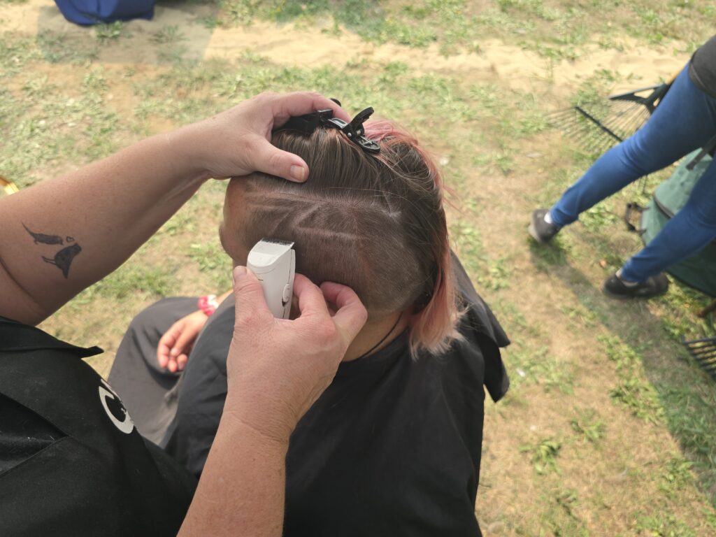 Hair before crossfade braid haircut at Day of Joy outreach event
