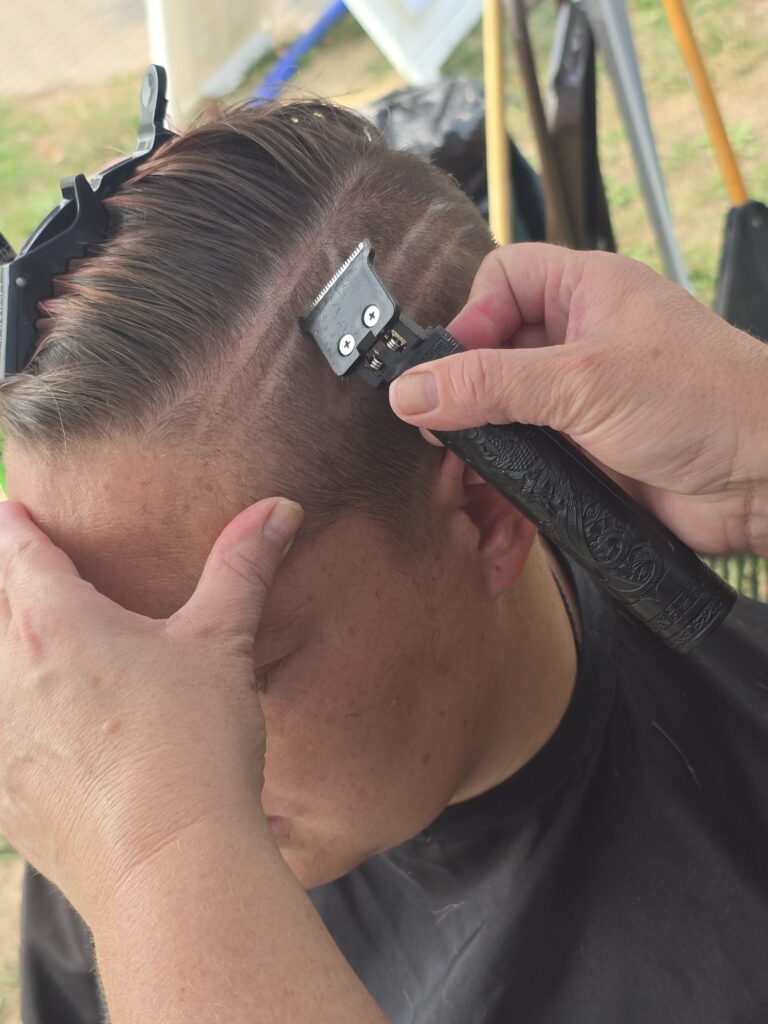 Hair before crossfade braid haircut at Day of Joy outreach event