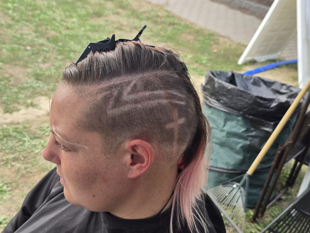 Hair before crossfade braid haircut at Day of Joy outreach event