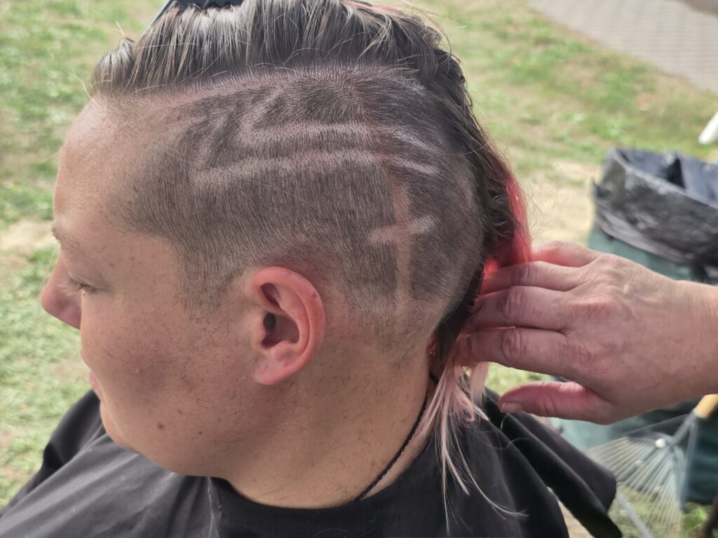 Hair before crossfade braid haircut at Day of Joy outreach event