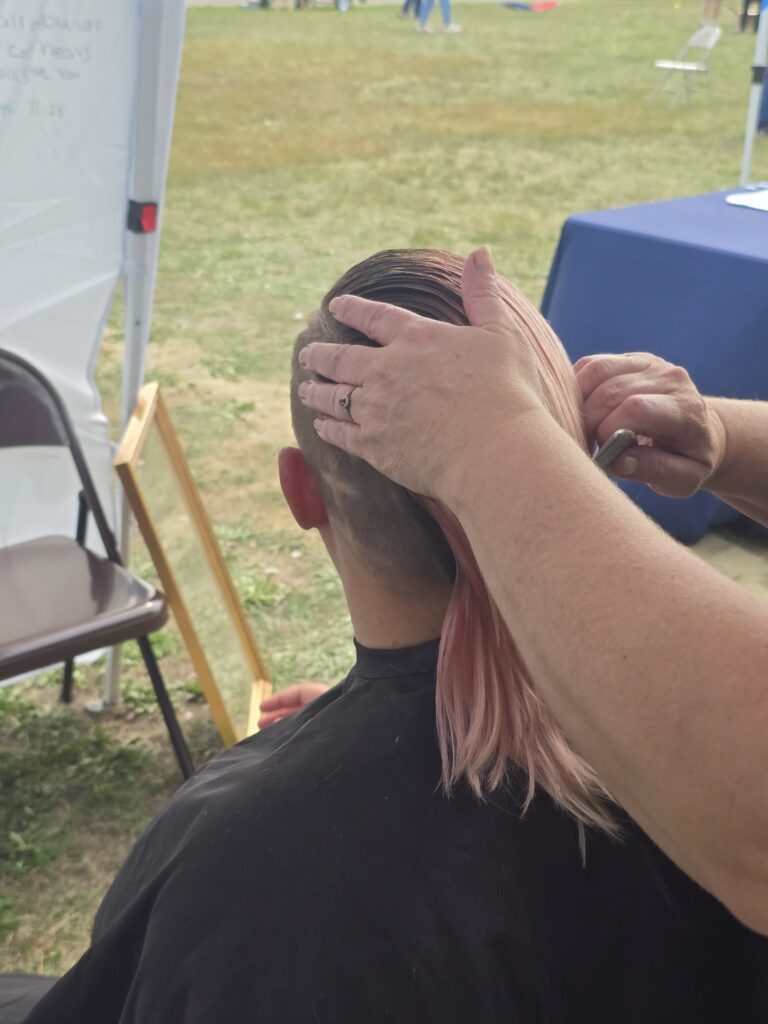 Hair before crossfade braid haircut at Day of Joy outreach event