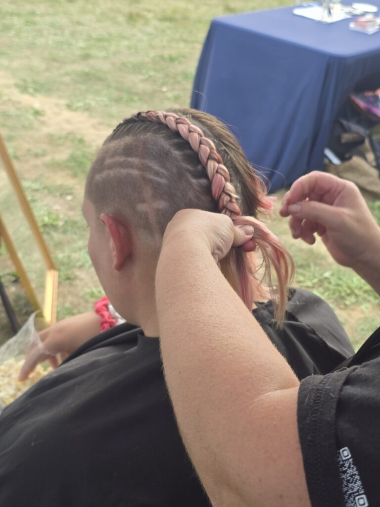 Hair before crossfade braid haircut at Day of Joy outreach event