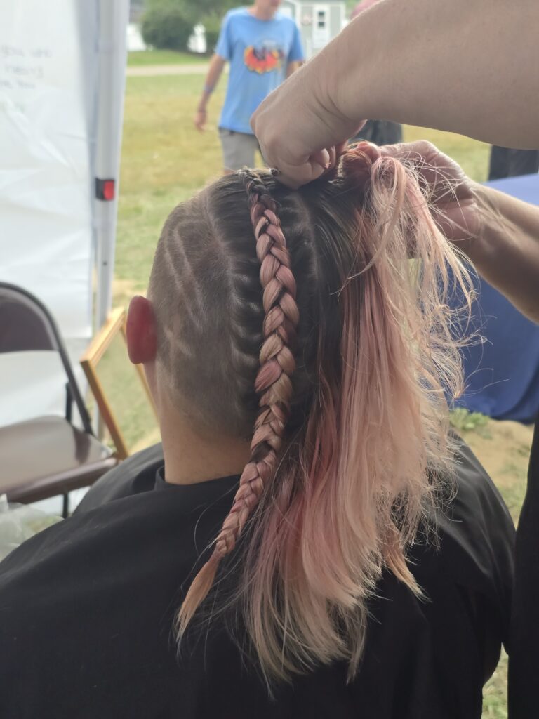 Hair before crossfade braid haircut at Day of Joy outreach event