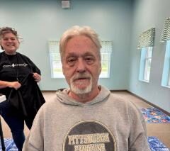 The gentleman getting a haircut